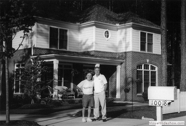 My colleague Larry with me in front of my home in Chapel Hill (2000).